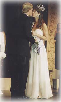 Mrs USA receives kiss from husband